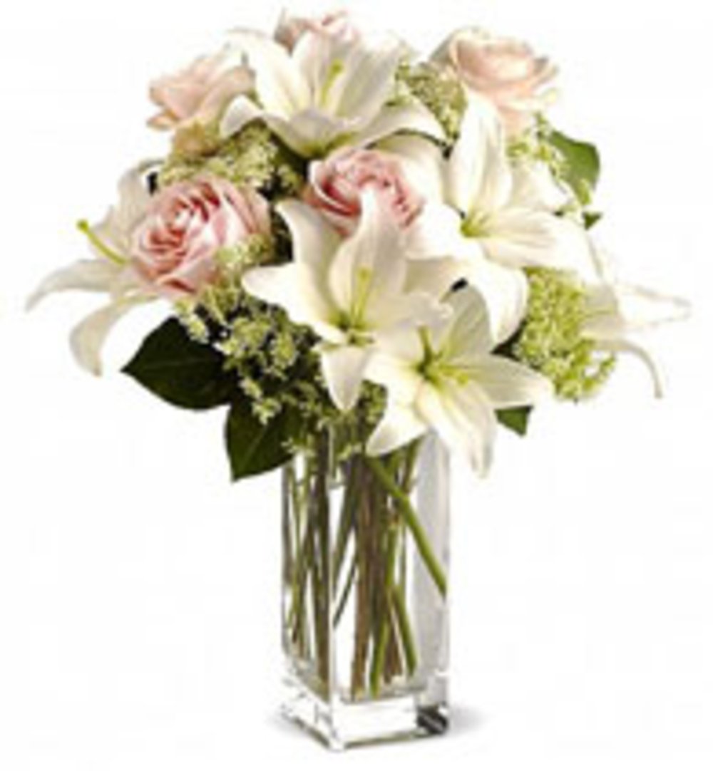 Vase with 5 Stems of White Lilies , 6 Stems of Off White Roses with Lady Lase or Gypsophelia